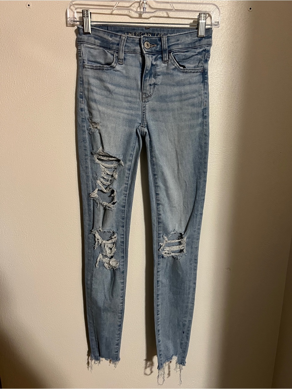 AMERICAN EAGLE Distressed Raw Hem Light Wash Denim Skinny Jeans Women's Size 000